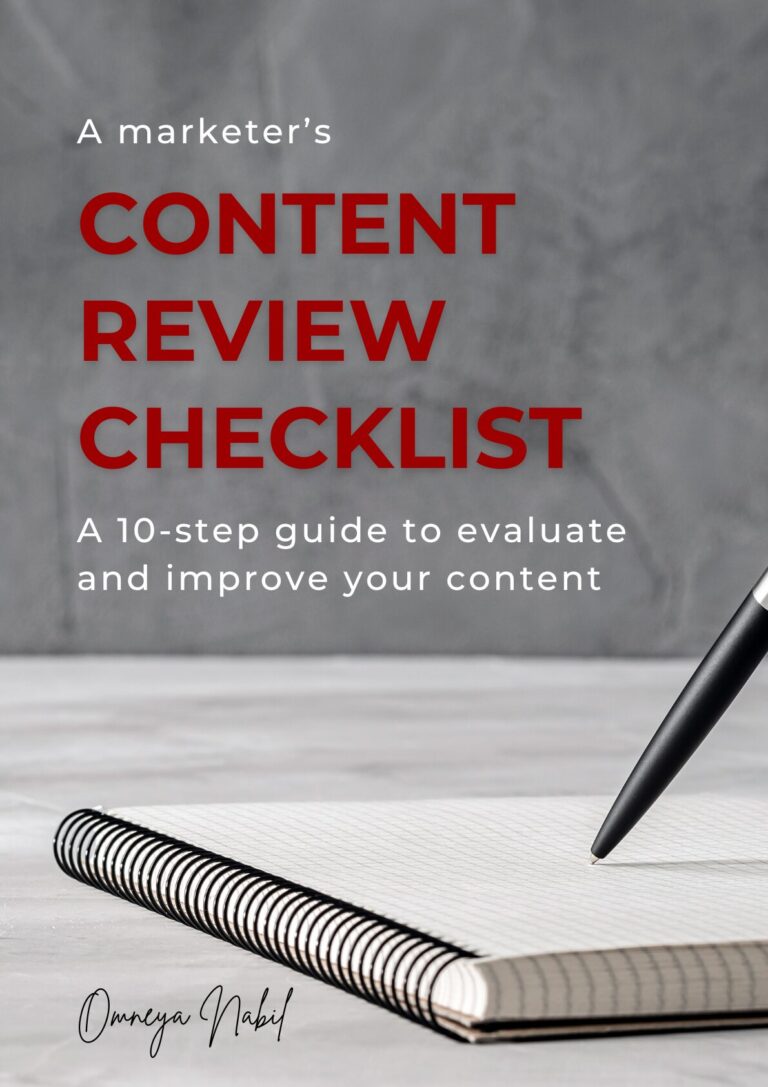 The cover of an eBook titled The Content Review Checklist, with the image of a notepad and pen in the background.