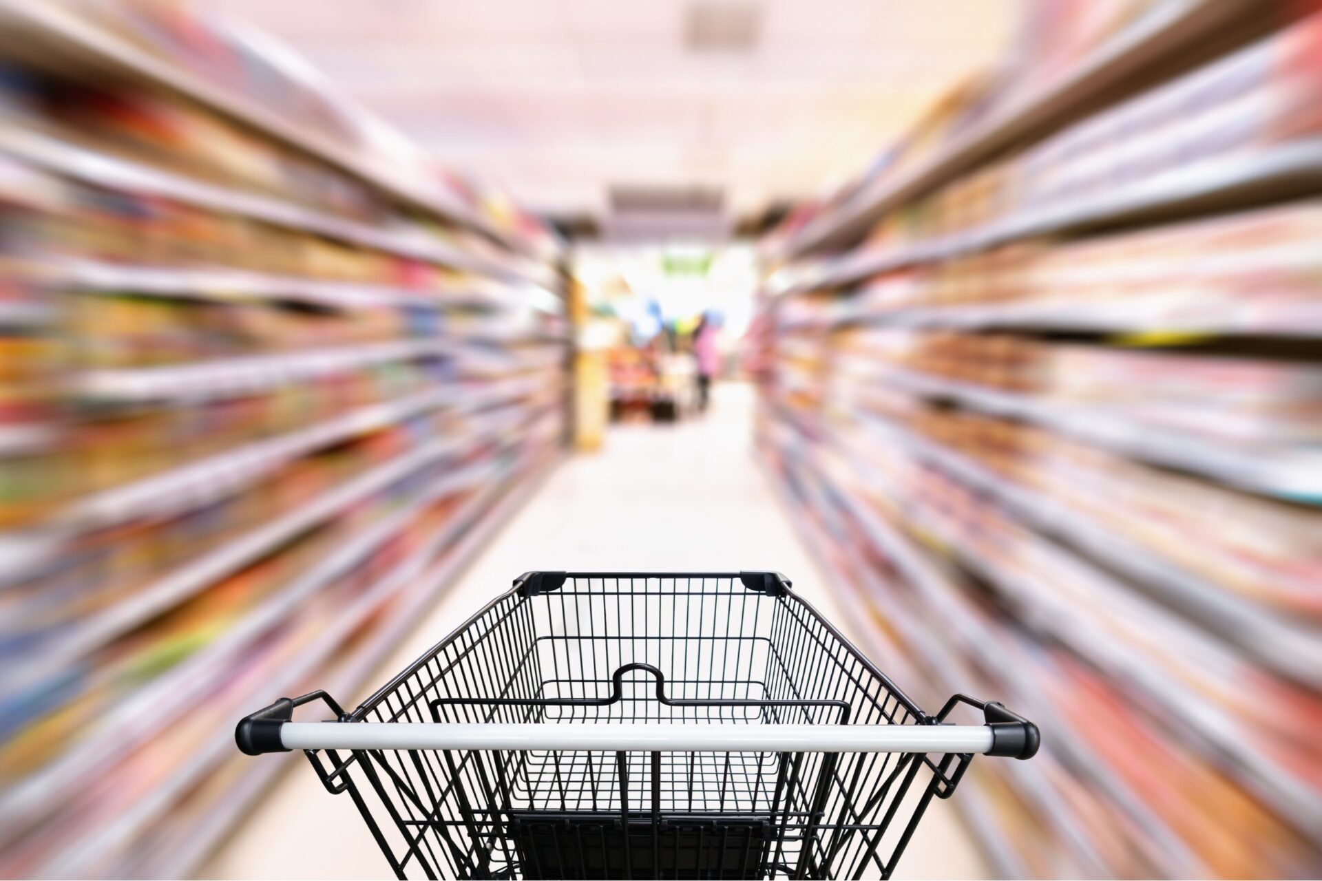 A trolley in a supermarket aisle